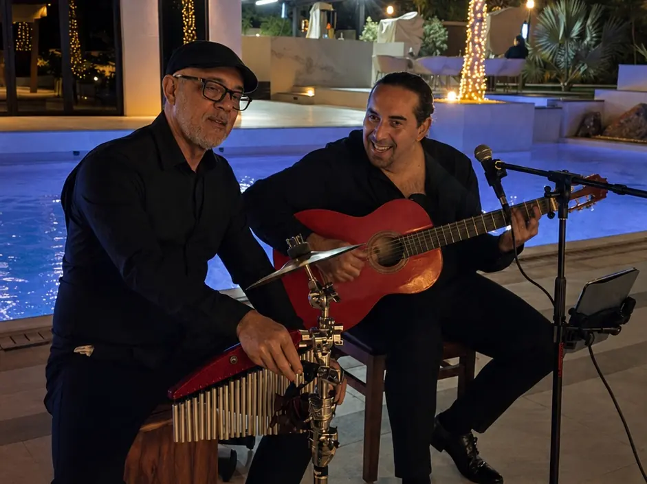 Flamenco guitar and cajón duo performing at night in Dubai