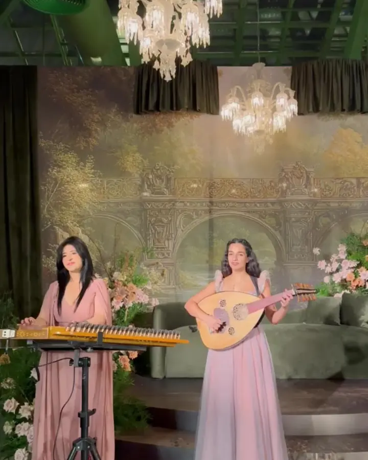 Qanun and oud duo performing at a wedding reception in Dubai