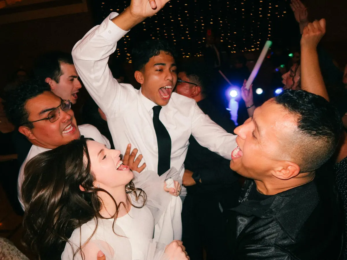 Wedding guests dancing to a live band